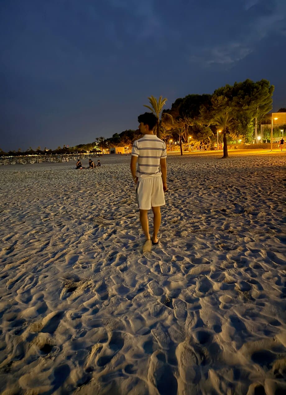 Andrei Iacob on a beach at dusk